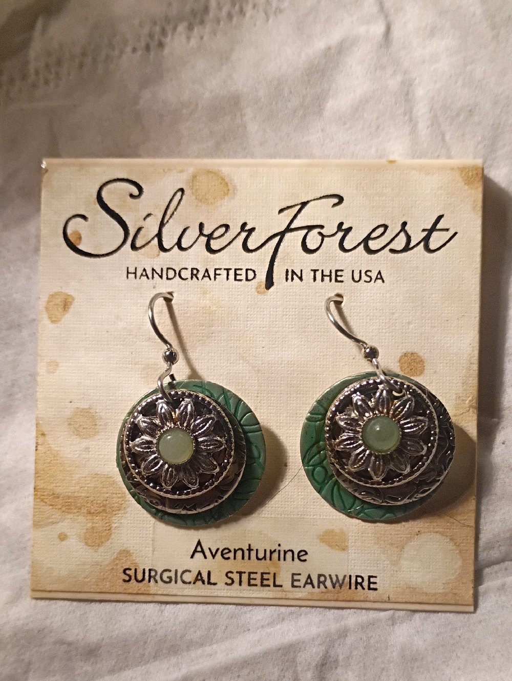 18K on Surgical Steel Silver flowers with green accents